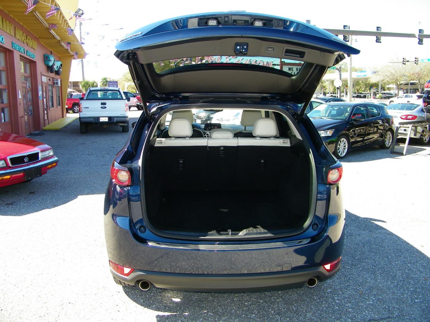 2018 Blue /Black Mazda CX-5 Grand Touring (JM3KFADM8J1) with an 2.5L L4 DOHC 16V engine, 6A transmission, located at 4000 Bee Ridge Road, Sarasota, FL, 34233, (941) 926-0300, 27.298664, -82.489151 - Photo#10